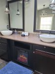 Dual vanity sinks with built-in space heater 